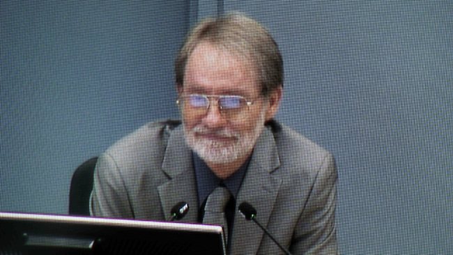 Ex-bishop sorry for smiling at hearing