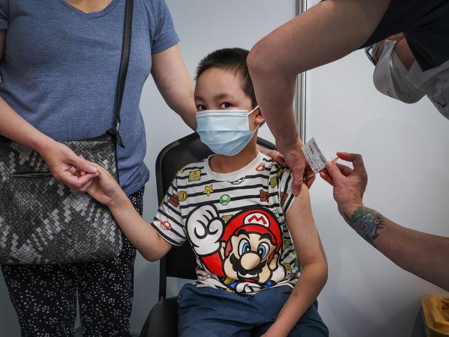 Zac, 8, gets his first jab at Sunshine Hospital Vaccination Hub. Picture: David Caird