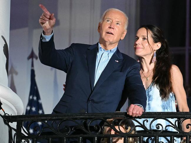 Ashley Biden stands with her father, then US President Joe Biden, as they watch the Independence Day fireworks from the Truman Balcony of the White House. Picture: AFP