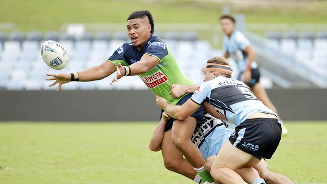 Raiders Centre Prinston Esera offloading during the SG Ball, NSWRL junior reps game Picture: Tim Hunter.