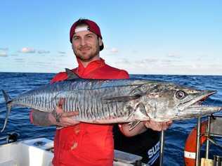 WHAT A CATCH! Jake Day with his "catch of a lifetime" Spanish mackerel that he landed between Rainbow Beach and Fraser Island. Picture: Contributed