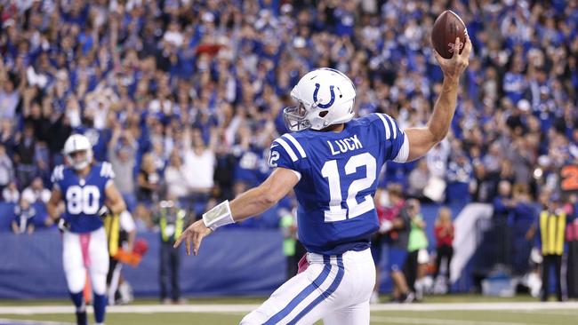 Andrew Luck celebrates after rushing for a 13-yard touchdown.