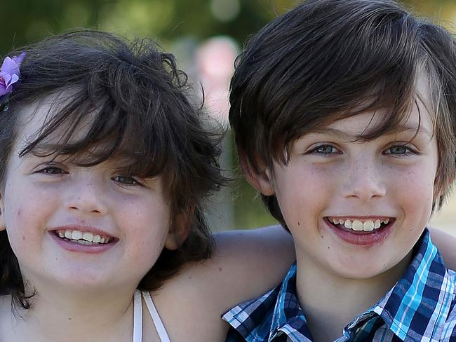 Glenn Porter with his kids, Cheyenne (7) and Jonathon (9) of Eight Mile Plains for Pride of Australia's Child of Courage medal. Cheyenne and Jonathon called triple 0 when Glen (insulin diabetic) wasn't responding. Pic: Josh Woning.