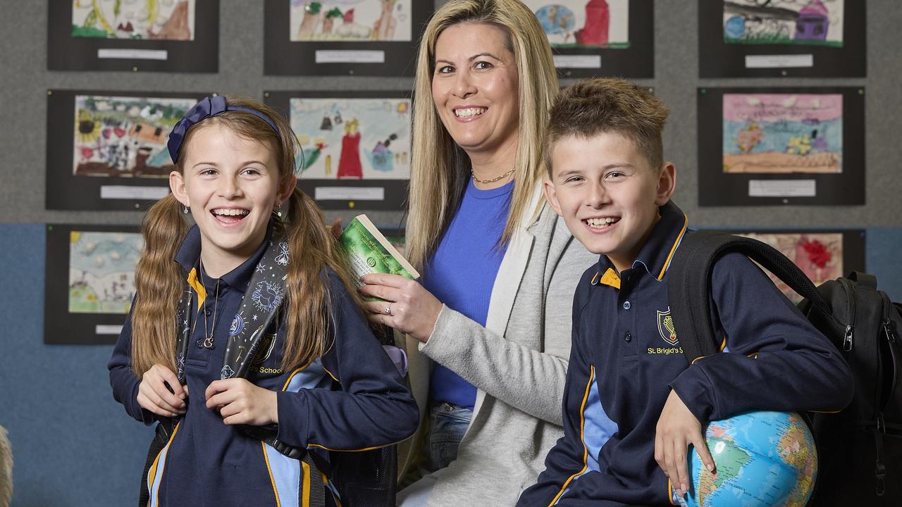 Tiana with mum, Mara Omar, and brother, Mateo at St Brigid's School in Kilburn. Picture: Matt Loxton