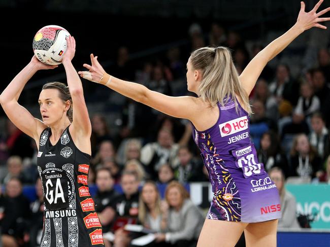 Nat Medhurst of the Magpies (left) contests with Kim Jenner  of the Firebirds during the Round 9 Super Netball match between the Collingwood Magpies and the Queensland Firebirds at Melbourne Arena in Melbourne, Sunday, June 23, 2019.  (AAP Image/Hamish Blair) NO ARCHIVING, EDITORIAL USE ONLY