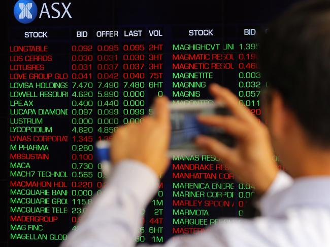 Digital market boards are seen at the Australian Securities Exchange (ASX) in Sydney in Sydney, Thursday, March 12, 2020. The Federal Government's stimulus package failed to lift the share market on Thursday, which slumped by as much as 7.16 per cent in the early afternoon. (AAP Image/Steven Saphore) NO ARCHIVING