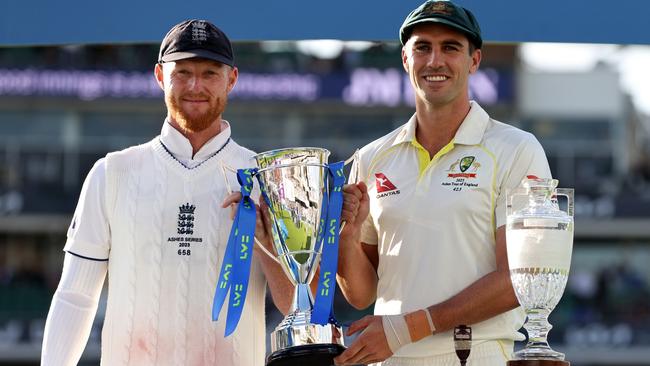 Ben Stokes and Pat Cummins pose with the Ashes trophy following day five of the fifth Test at The Oval. Picture: Getty Images