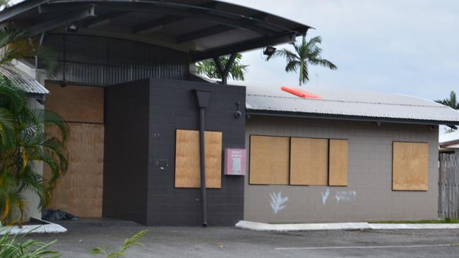 Anglicare NQ has a website outlining facilities and programs at the 40 bed Quigley St night shelter in Cairns – but the facility has been boarded up for some time. Picture: Bronwyn Farr