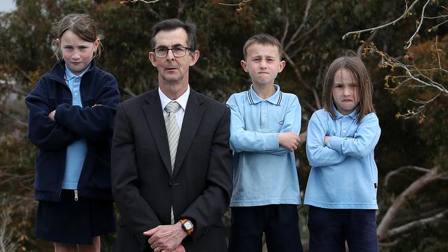 Birralee Primary School's enrolment has increased by almost 200 per cent since 2013. School principal Ashley Ryan, with students Molly, Noah and Jemma. Picture: George Salpigtidis