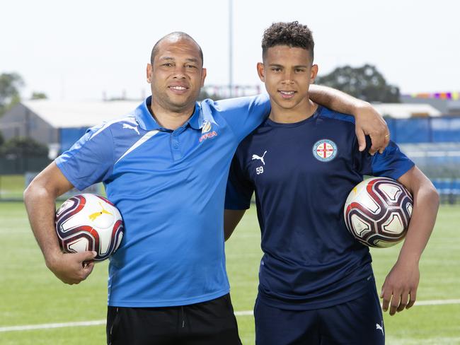 Former Adelaide United Striker Cristiano dos Santos Rodrigues with son Rafael dos Santos Rodrigues on the Soccer pitch at The Parks, Angle Park. Rafa has been signed with A-League club Melbourne City. (AAP/Emma Brasier)