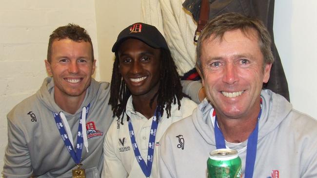 Dandenong coach Nick Speak enjoys the premiership celebrations with Peter Siddle and LJ Edwards. Pic: Liz Williamson World of Photography.