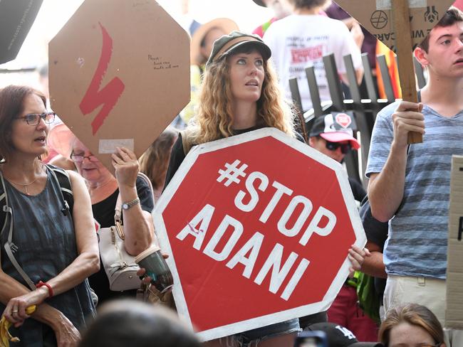 Anti-Adani coal mine protesters stage a sit-in in Brisbane. AAP Image: Dan Peled. 