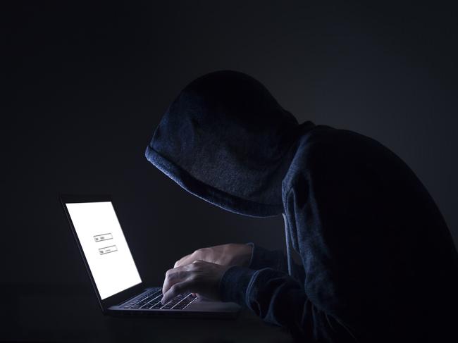 Hacker performing cyber attack on laptop Picture: iStock