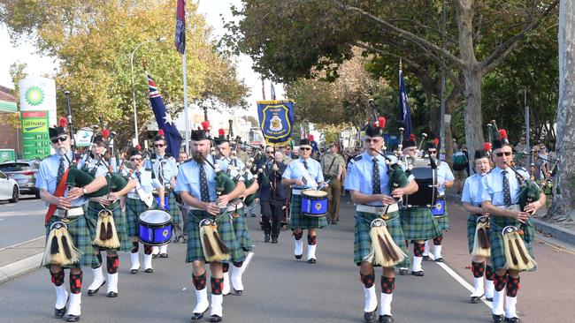 Pipers led the parade through Mascot on Sunday. Picture: Simon Bullard