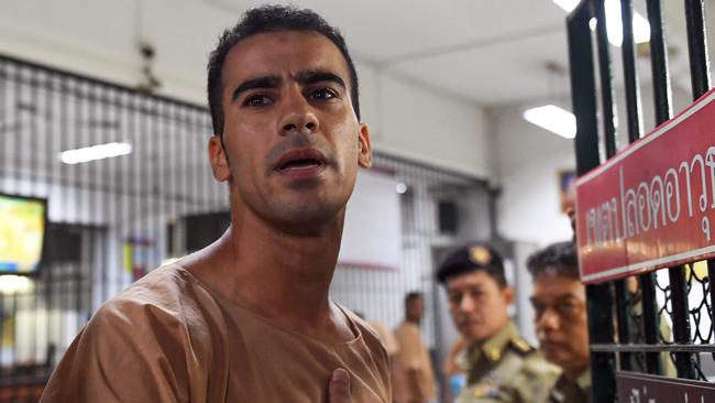 Hakeem al-Araibi is escorted to a courtroom in Bangkok on Monday. Picture: AFP