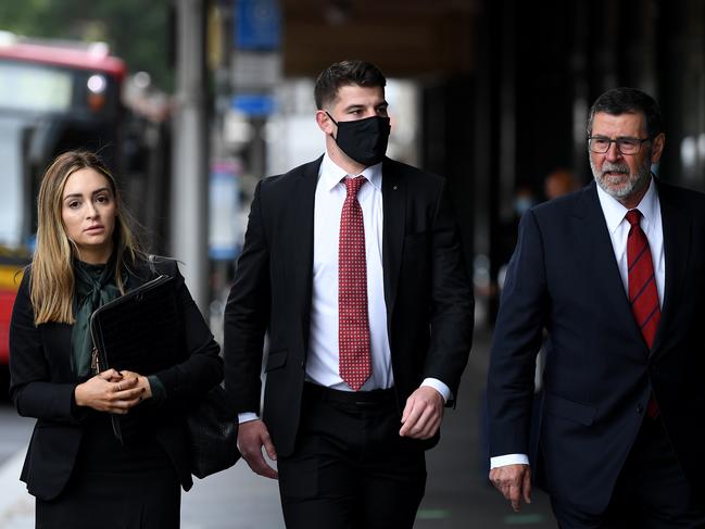 Curtis Scott (centre) has been awarded more than $100,000 in legal costs after the police case against him collapsed earlier in the month. Picture: NCA NewsWire/Joel Carrett