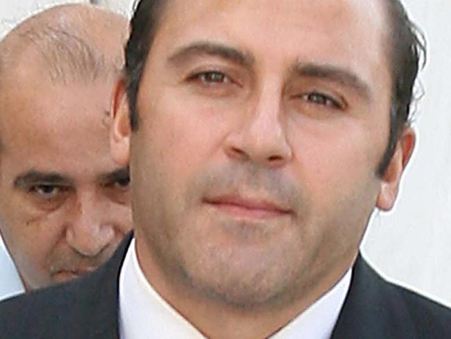 01/06/2008 LIBRARY: Aust fugitive Victorian gangland member Tony Mokbel being escorted by Greek police officers outside court in Athens, Greece 09 Oct 2007.