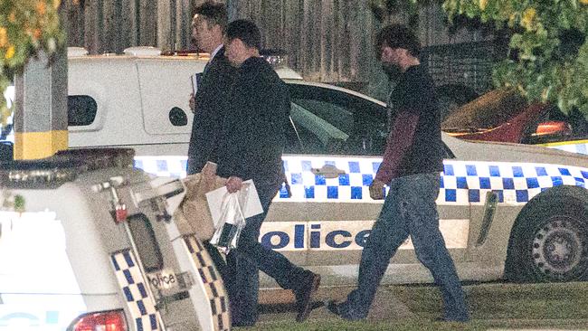 Christian Bain-Singh is walked from the Cranbourne Police Station after an out of session appearance over the death of Melbourne woman Rani Featherston. *ID KORSSEN* Picture: Mark Stewart