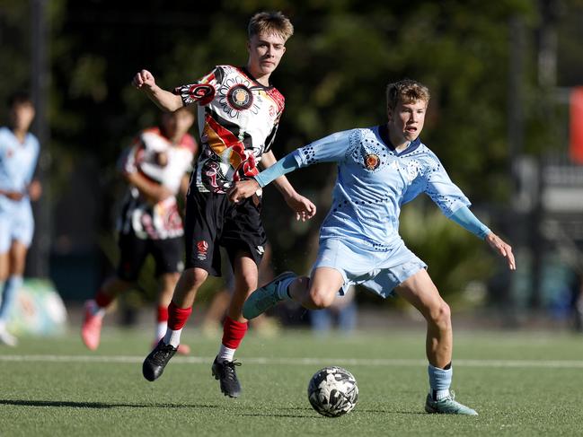 Ashton Hawkett on the move. Picture: Michael Gorton. U16 Boys NAIDOC Cup at Lake Macquarie Regional Football Facility.