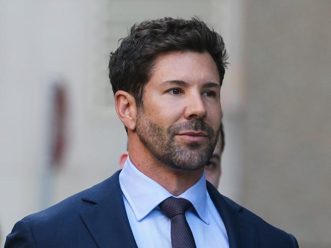 SYDNEY, AUSTRALIA - Newswire Photos - AUGUST 02 2023:  Former Commando Heston Russell is seen arriving at the Federal Court in Sydney with his legal team. Russell is suing the ABC for defamation. Picture: NCA Newswire /Gaye Gerard