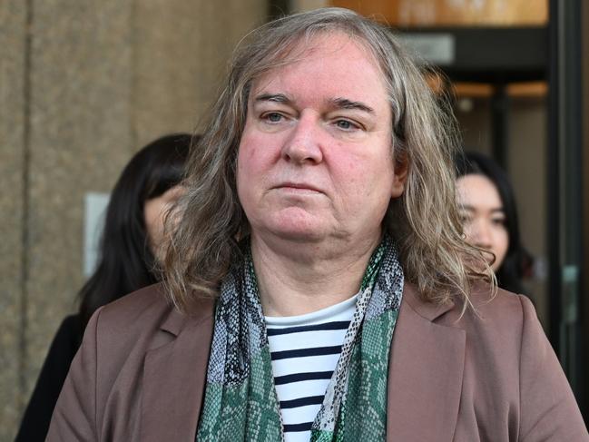 Roxanne Tickle leaves the Federal Court of Australia in Sydney, Friday, August 23, 2024. Transgender woman Roxanne Tickle was barred from using the female-only platform Giggle for Girls and has accused the social media site of discrimination. (AAP Image/Dean Lewins) NO ARCHIVING