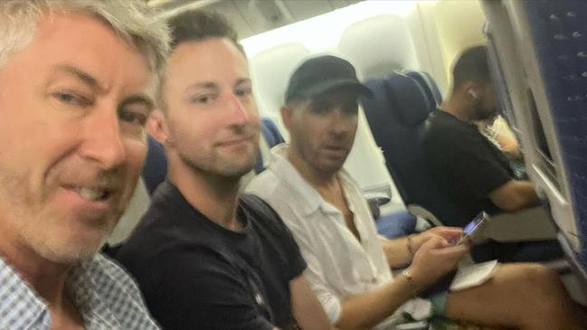 Australian actor Hugh Sheridan, right, flees Israel on a flight to Athens. Picture: Instagram