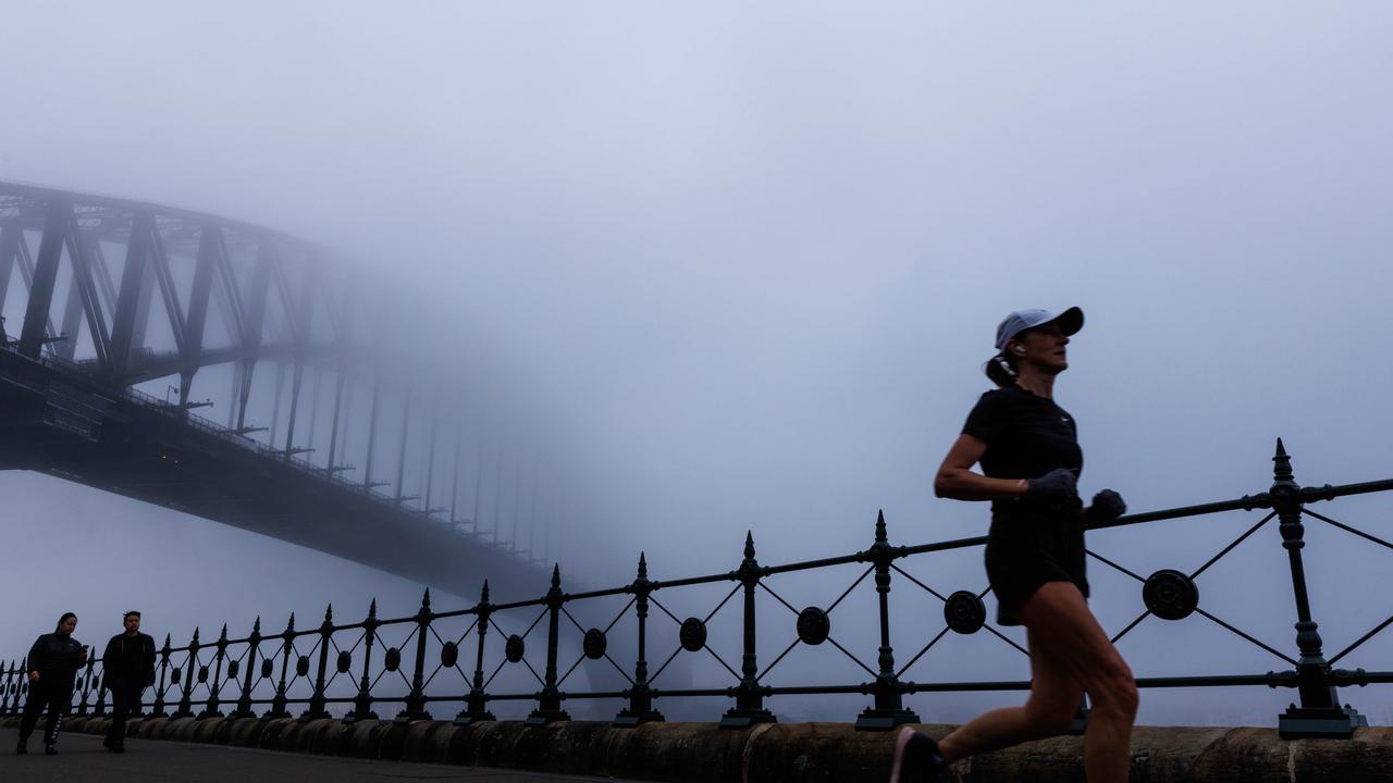 A thick Sydney fog stopped the ferries on the harbour this morning. Picture: NCA NewsWire / David Swift