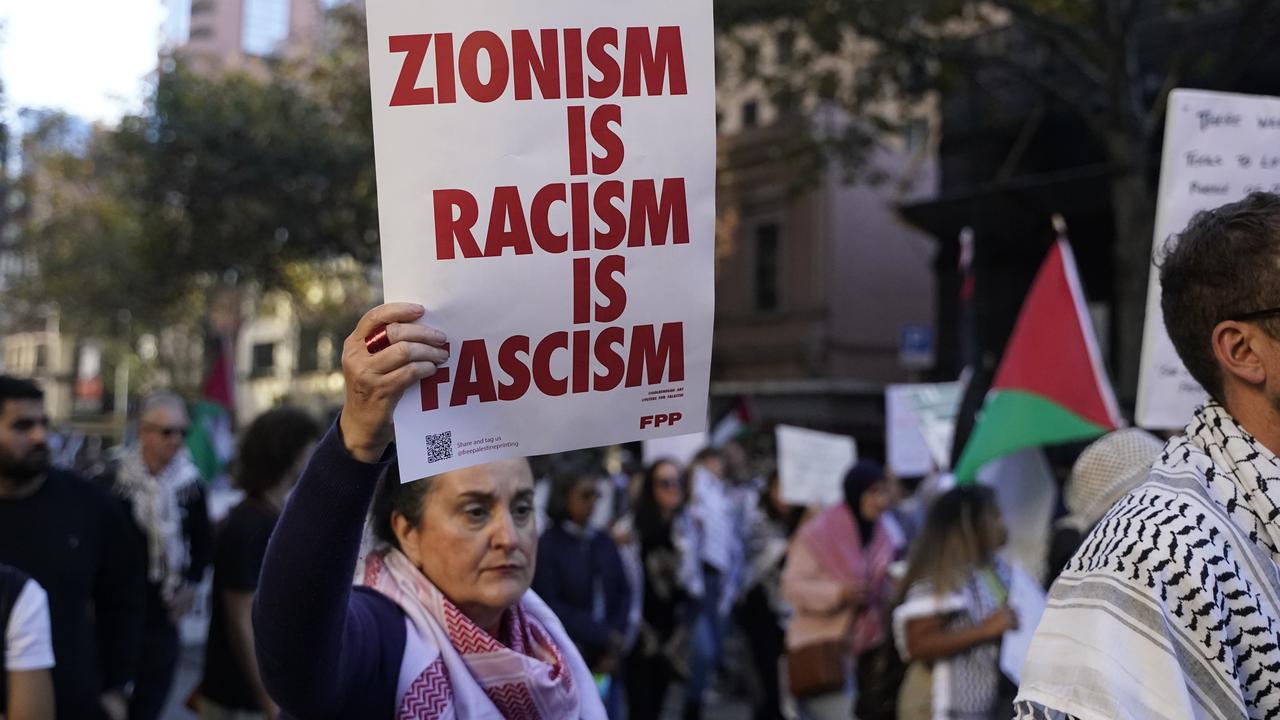 Slogans equating Israel with fascism were seen in the Melbourne march. Picture: NCA NewsWire / Valeriu Campan