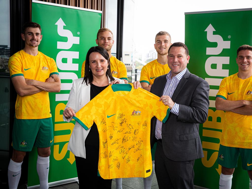 Subway’s Rodica Titeica (front left) and FA CEO James Johnson celebrate the new sponsorship deal. Picture: Supplied