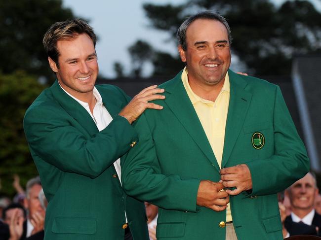 13/04/2009 WIRE: AUGUSTA, GA - APRIL 12: Trevor Immelman of South Africa congratulates Angel Cabrera of Argentina during the green jacket presentation after Cabrera defeated Kenny Perry on the second sudden death playoff hole to win the 2009 Masters Tournament at Augusta National Golf Club on April 12, 2009 in Augusta, Georgia. Harry How/Getty Images/AFP == FOR NEWSPAPERS, INTERNET, TELCOS & TELEVISION USE ONLY ==