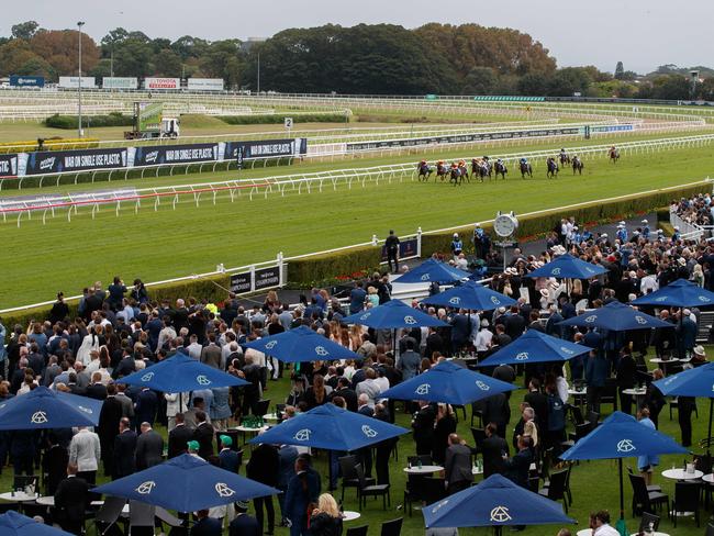 WEEKEND TELEGRAPH APRIL 1, 2023A very rainy race day at Randwick Racecourse for the Championship Stakes day. Race 6 at Randwick today during a break in the rain. Picture: David Swift