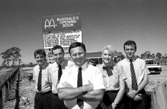 Ron Reseck (centre) and staff members (from left) Dean Bennett, Brent Gilmore, Angela Grieve and Trevor Rogers outside Mackay’s first McDonald’s Restaurant ahead of its opening in 1990. Picture: DAILY MERCURY ARCHIVES