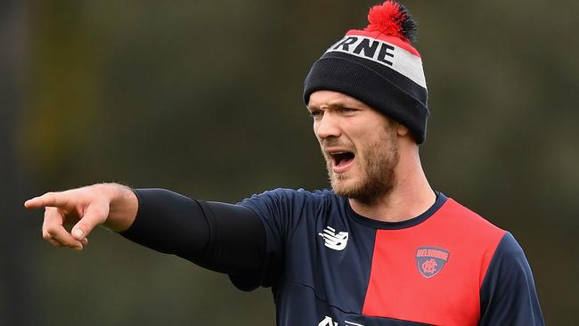 MELBOURNE, AUSTRALIA — JUNE 06: Max Gawn of the Demons points during a Melbourne Demons AFL training session at Gosch's Paddock on June 6, 2017 in Melbourne, Australia. (Photo by Quinn Rooney/Getty Images)