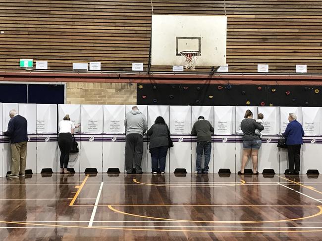 Voters at Robertson's biggest polling booth at Erina High School.