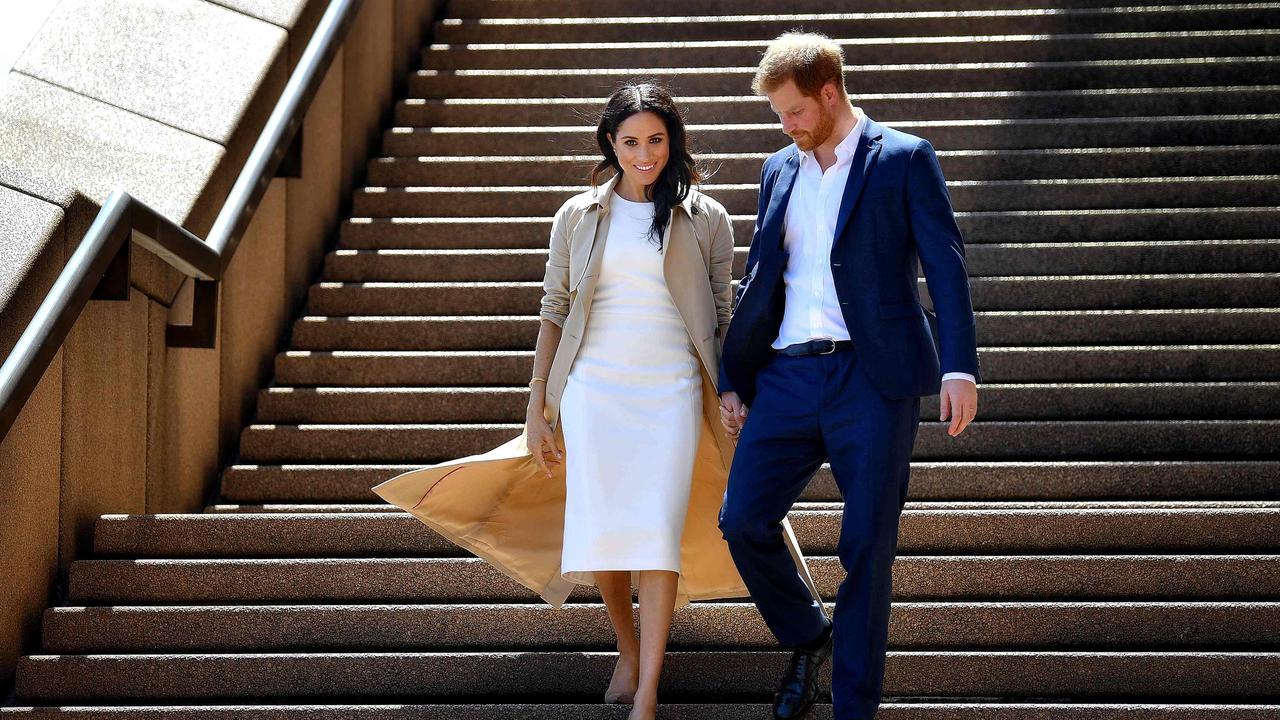 Prince Harry and Meghan Markle on the stairs of the iconic Opera House in October 2018.