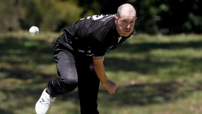 Camberwell skipper Andrew Fekete bends his back. Picture: Andy Brownbill