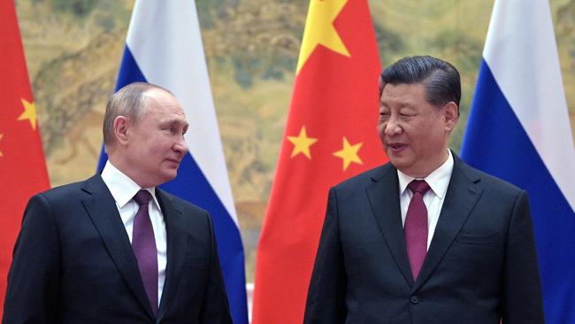 Russian President Vladimir Putin and Chinese President Xi Jinping during their meeting in Beijing, on February 4, 2022. (Photo by Alexei Druzhinin / Sputnik / AFP)