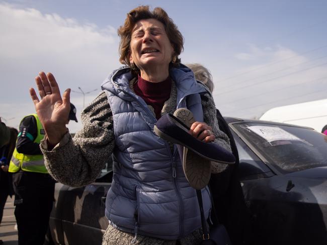 Natalia, 50 of Mariupol reacts after arriving at an evacuation point for people fleeing Mariupol, Melitopol and the surrounding towns under Russian control. A car bomb exploded there injuring two people. Picture: Getty Images