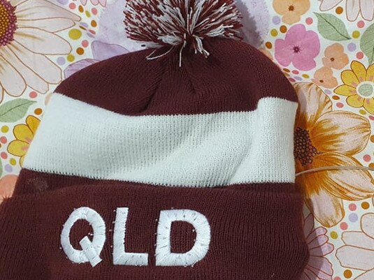 The free beanie handed out at the Townsville State of Origin on Wednesday that contained a button battery.