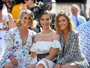 FROCKED UP: Rachel Hohenhaus, Taryn Koch and Stacey Creedy at the 2019 Ipswich Cup. Picture: Rob Williams