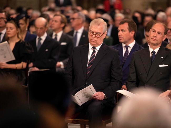 Prince Andrew attends the memorial.