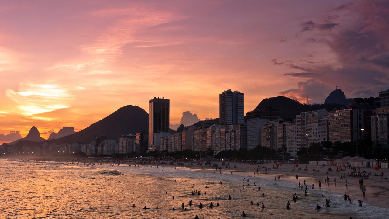 A sunset in Copacabana Beach, Rio de Janeiro, Brazil, a tourist hot spot which is now being marred by crime. Picture: iStock