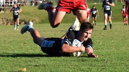 Josh Moffitt scores a try for the Terrigal-Wamberal Sharks against Kincumber. Photo: Jodie Ward.