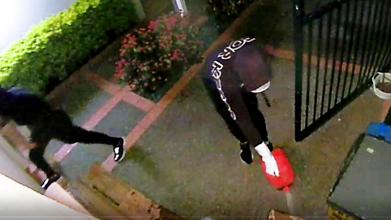 Queensland Police have released CCTV footage of two men who they believe may be able to assist with investigations into three arson incidents. Picture: Queensland Police