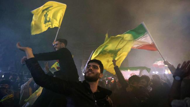 Iranian demonstrators celebrate outside the British Embassy in Tehran after Iran fired a barrage of missiles into Israel. Picture: Atta Kenare/AFP