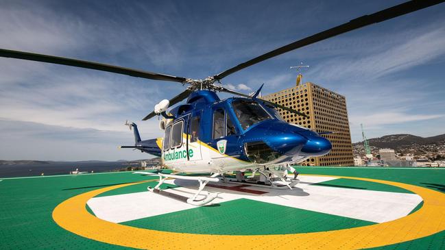 An ambulance helicopter on the new helipad at the Royal Hobart Hospital.