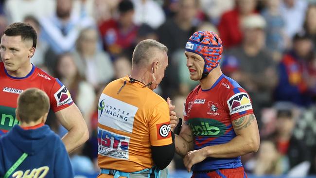 NEWCASTLE, AUSTRALIA – AUGUST 27: Kalyn Ponga of the Knights reacts as he receives treatment during the round 26 NRL match. between Newcastle Knights and Cronulla Sharks at McDonald Jones Stadium on August 27, 2023 in Newcastle, Australia. (Photo by Jenny Evans/Getty Images)