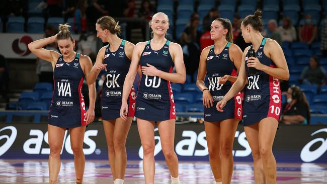 Vixen players celebrate following their round two Super Netball win over the Sydney Swifts. Photo: Getty Images