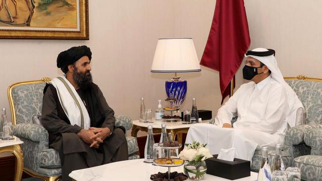 Qatar's Deputy Prime Minister and Foreign Minister Sheikh Mohammed bin Abdulrahman al-Thani(R) meeting with Taliban co-founder Mullah Abdul Ghani Baradar on the sidelines of the of the Afghan negotiations. Picture: AFP