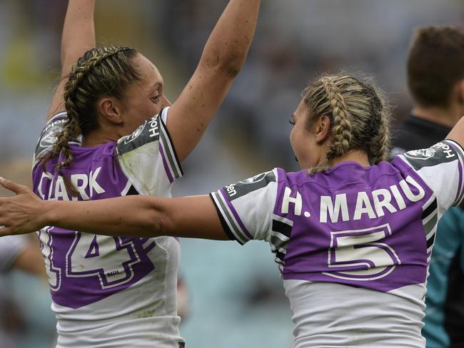 Warriors Sarina Clark and Hilda Mariu celebrate the team’s first victory. Pic: Getty Images